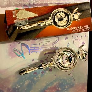 Brand new silver tea strainer